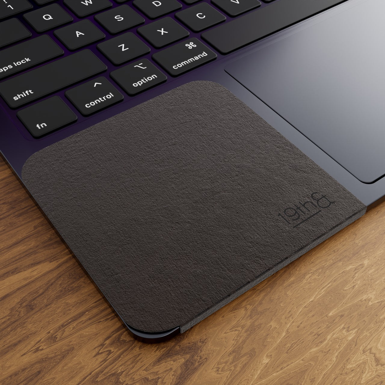 Small Black WatchPad on Macbook